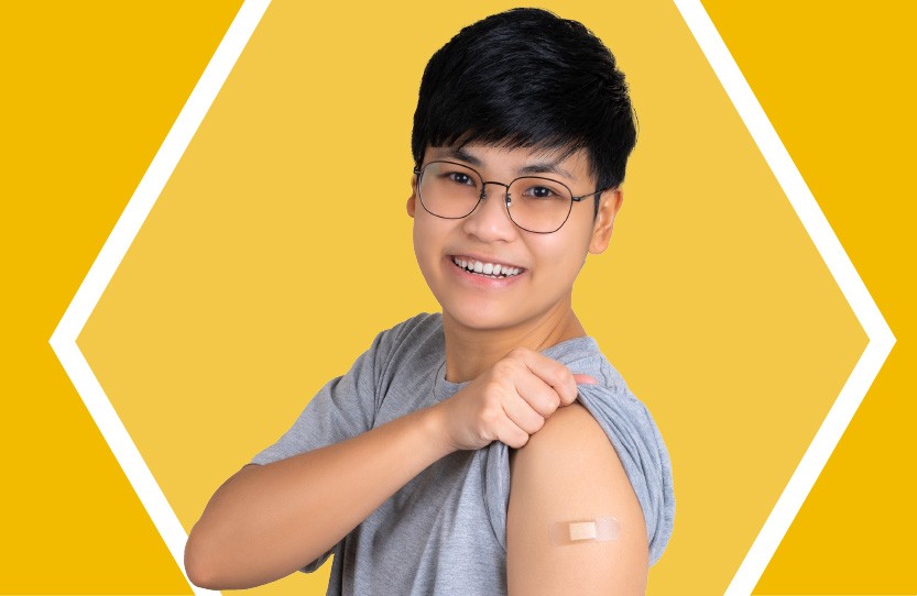 Child with band aid on arm